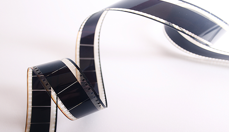 coiling strip of film